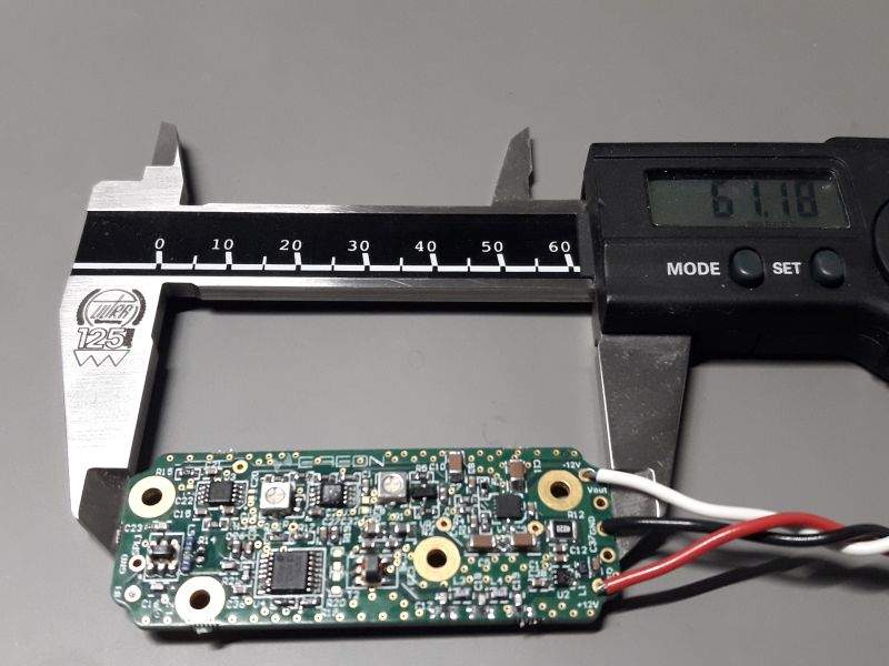 IFF radar receiver limiting-amplifier and envelope-detector board beside a digital caliper